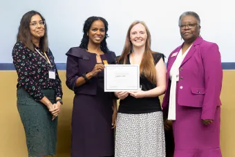 four scholars with award