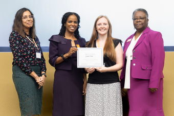 four scholars with award